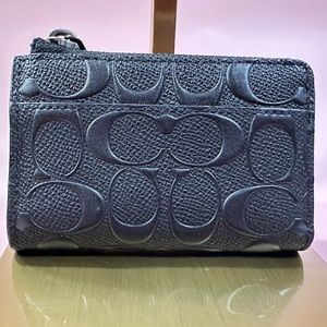 Small black coin and card COACH logo wallet with a key ring